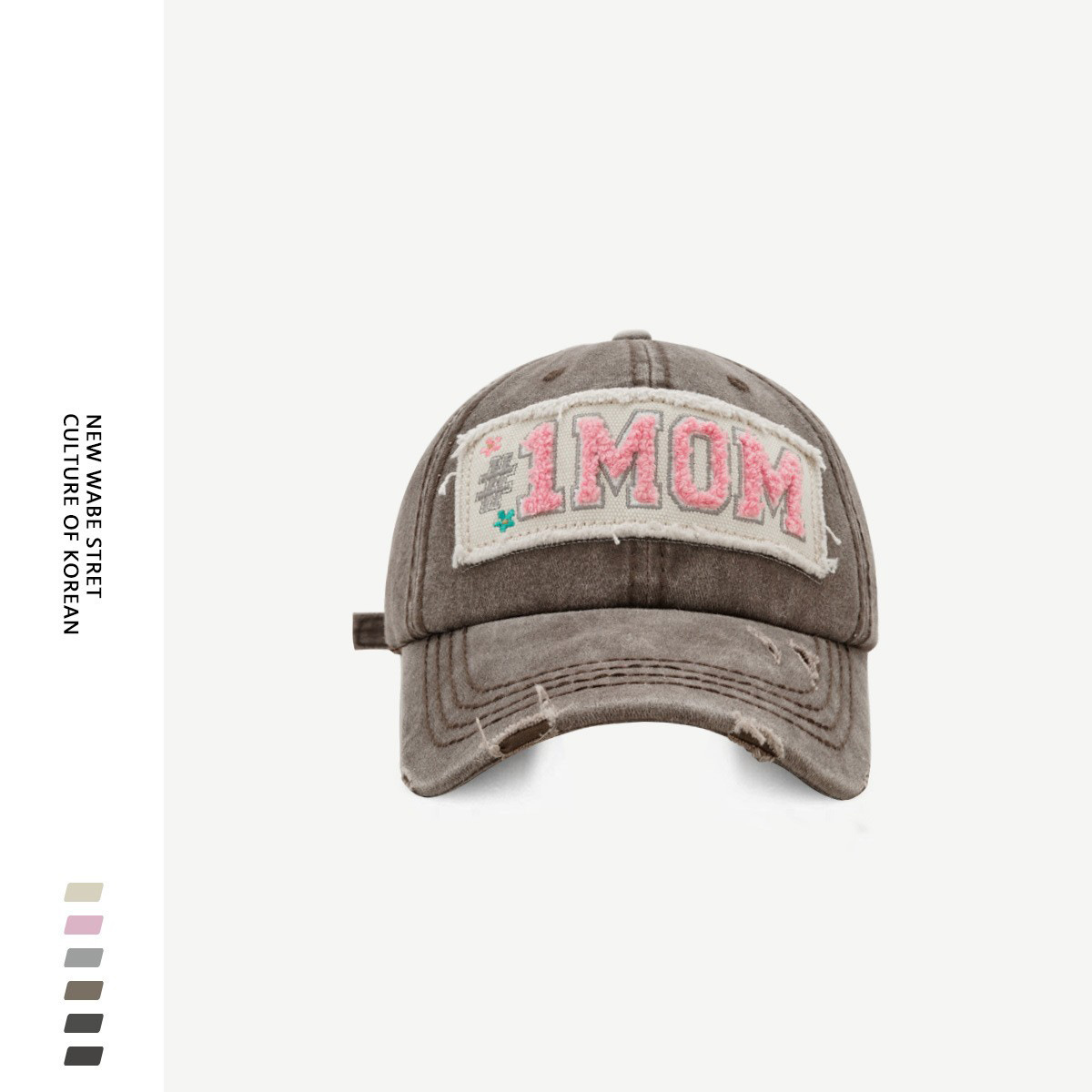 Toalla de diseño original carta bordada etiqueta de tela gorra de béisbol hombres y mujeres Otoño e Invierno estilo coreano moda de la calle rasgado gorra de pico