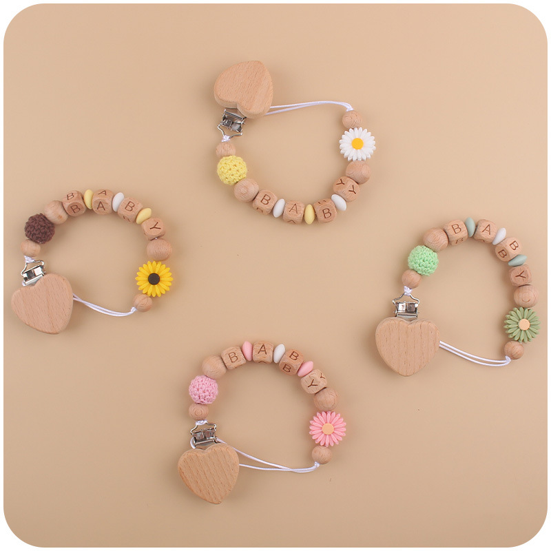 Nuevo bebé haya melocotón corazón calmante bebé DIY dibujos animados Margarita cuentas de silicona mordedura pezón cadena