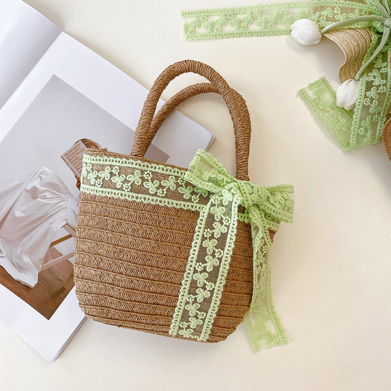 Nicho popular estilo coreano tulipán arco de papilla para niñas sombrero de paja paquete de bolsas pequeñas frescas dulces gorras de protección solar