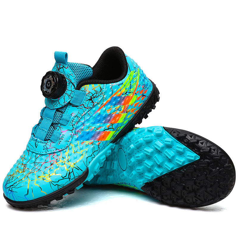 Nuevo botón giratorio sin lazos zapatos de fútbol niños y niñas TF clavos rotos zapatos de fútbol zapatos de entrenamiento