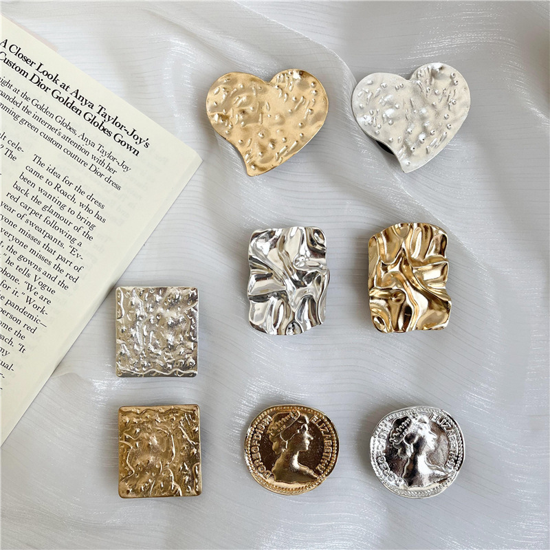 Retro estilo frío metal airbag soporte perezoso soporte de escritorio pegatina retráctil plegable cojín de aire soporte del teléfono móvil