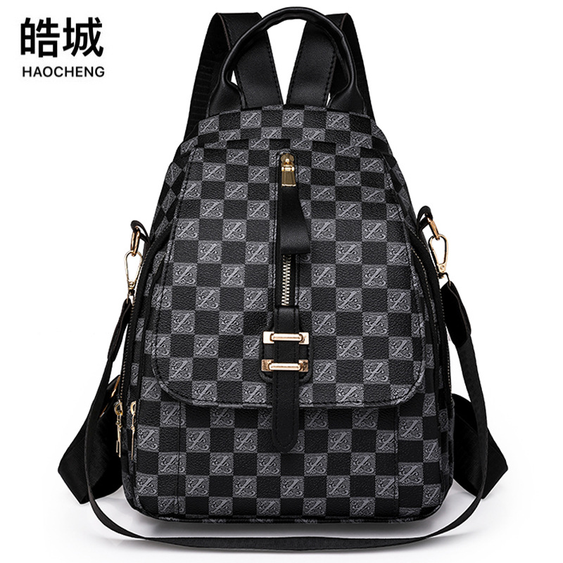 2023 invierno nuevo estilo casual mujer mochila de cuero suave simple y versátil color de contraste al aire libre mochila de viaje mochila escolar
