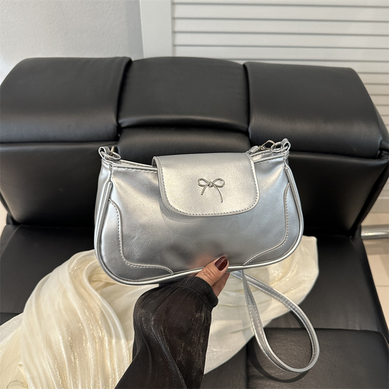 Bolsa de viaje retro para mujeres 2025, nueva moda, bolso de brazo de arco de moda, bolso de brazo elegante y dulce.