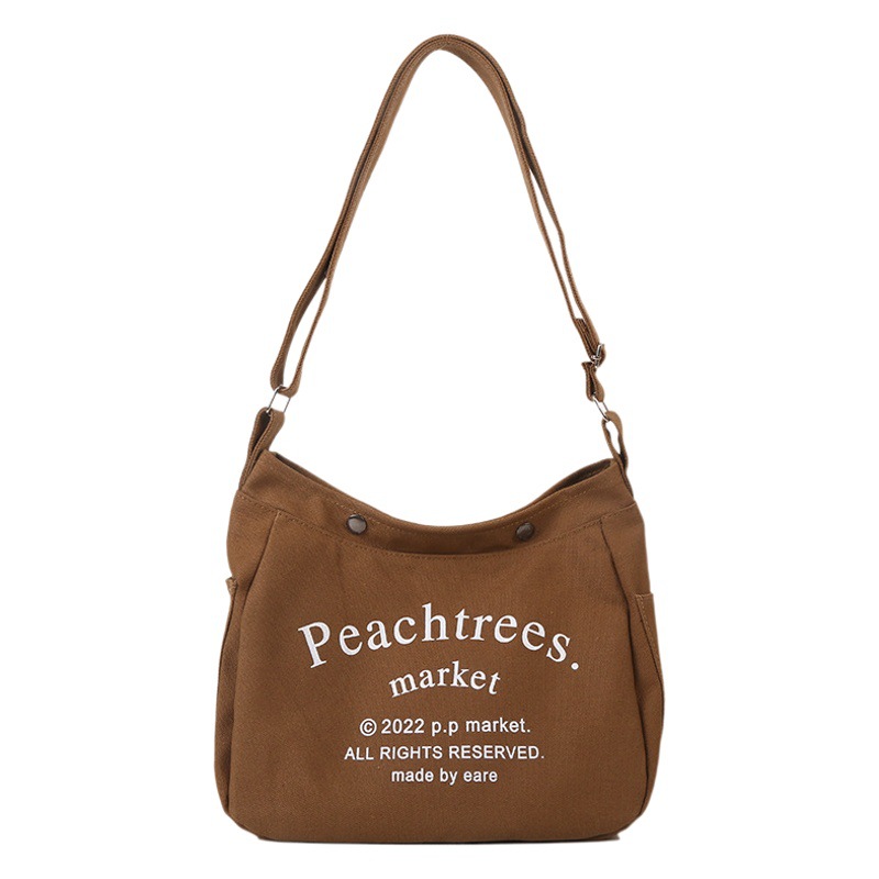 Estilo coreano Comercio Exterior de Los Niños del bolso de moda carta lienzo bolsa de mensajero fresco de moda hombres y niñas de gran capacidad bolso de hombro ligero