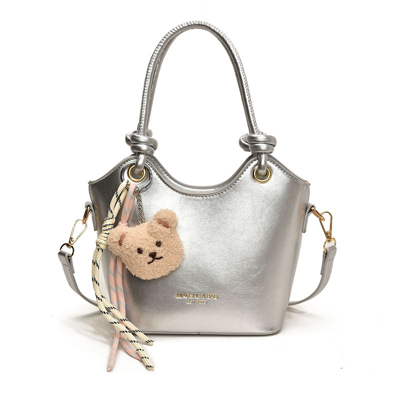 Popular ultra caliente bolso de cubo de mano para mujeres 2025 nuevo nicho Zhong universal bolso de viaje casual simple mochila de hombro