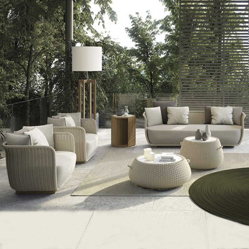 Sofá al aire libre simple nórdico patio jardín de caña trenzado ocio al aire libre mesa de té terraza combinación de muebles de comercio exterior