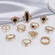New jewelry personality black gem elephant Lotus Crown Cross 11-piece set ring