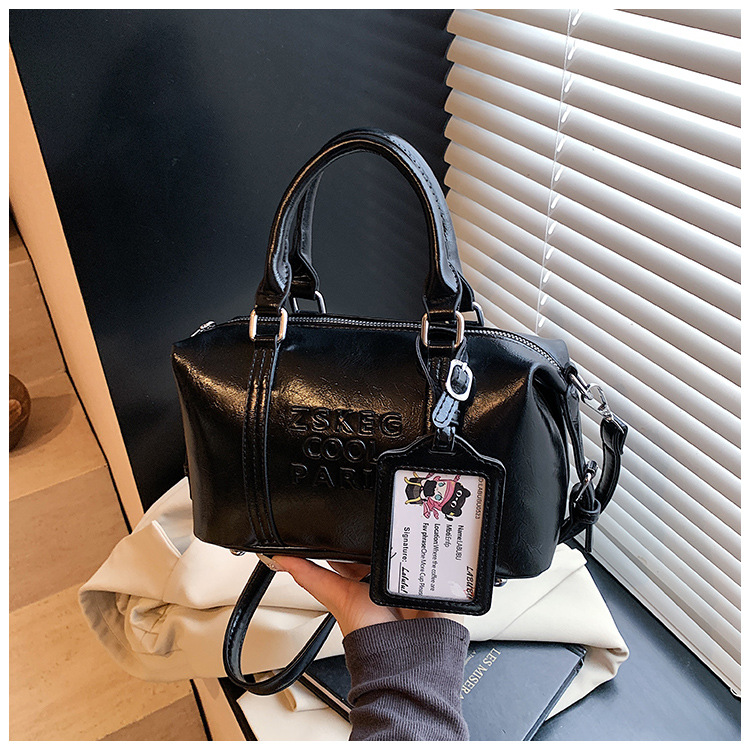 Korean version hand-held bowling bag for women 2025 new retro niche commuting pillow bag versatile single-shoulder crossbody bag undefined