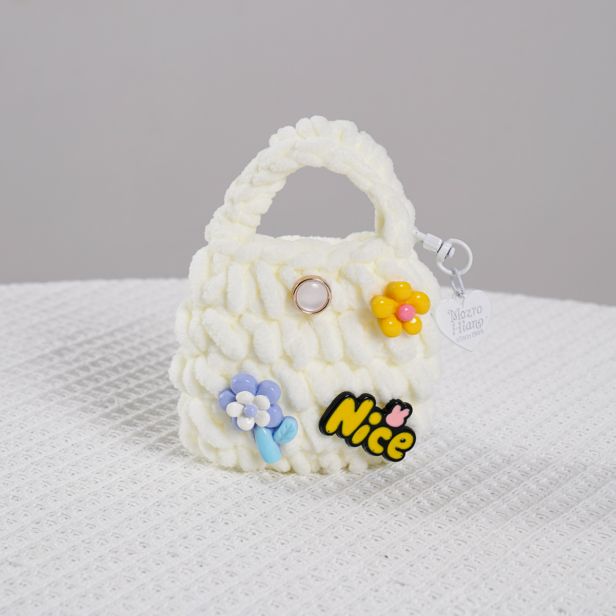 Productos terminados japoneses INS dulce, creativo, encantador, gancho artesanal, auriculares Bluetooth resistentes a la caída, bolso transfronterizo Amazon