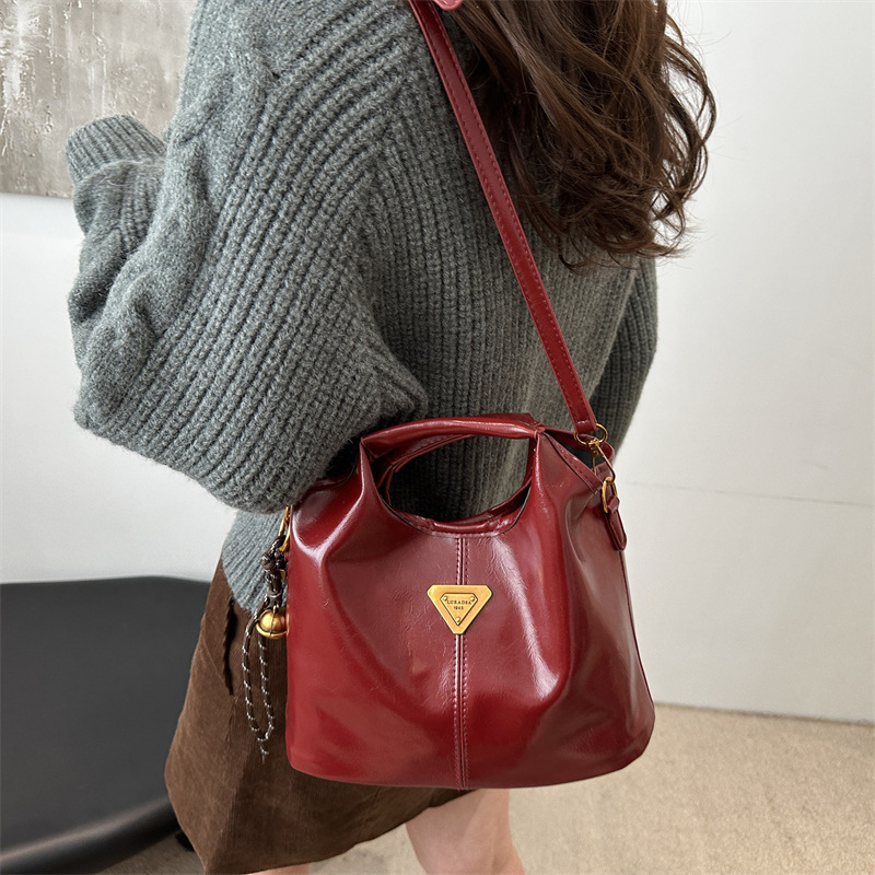 2024 alto valor retrógrado estilo de negocios Meillard bolso de cubo de mano de viaje versátil de invierno nuevo bolso de hombro