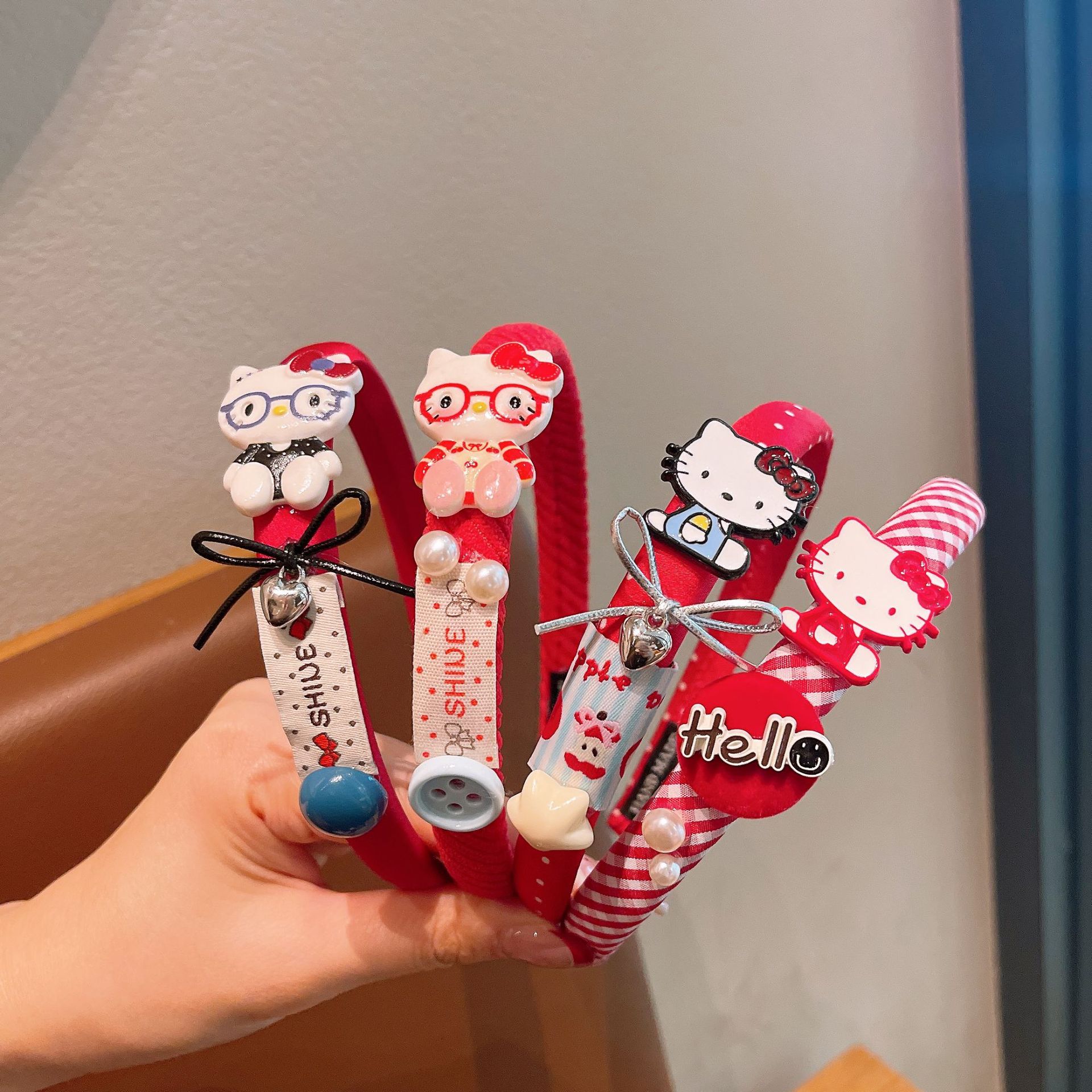 Nuevos niños al por mayor esponja banda de cabello de dibujos animados KT gato arco clip de cabello no estrangulación cabeza alta cráneo bebé joyería de cabello
