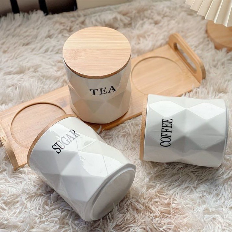 Tanque cerámico creativo de sello de bambú cubierta de cocina alimentos a prueba de humedad de alto valor facial conjunto de té de café lata a granel para el hogar