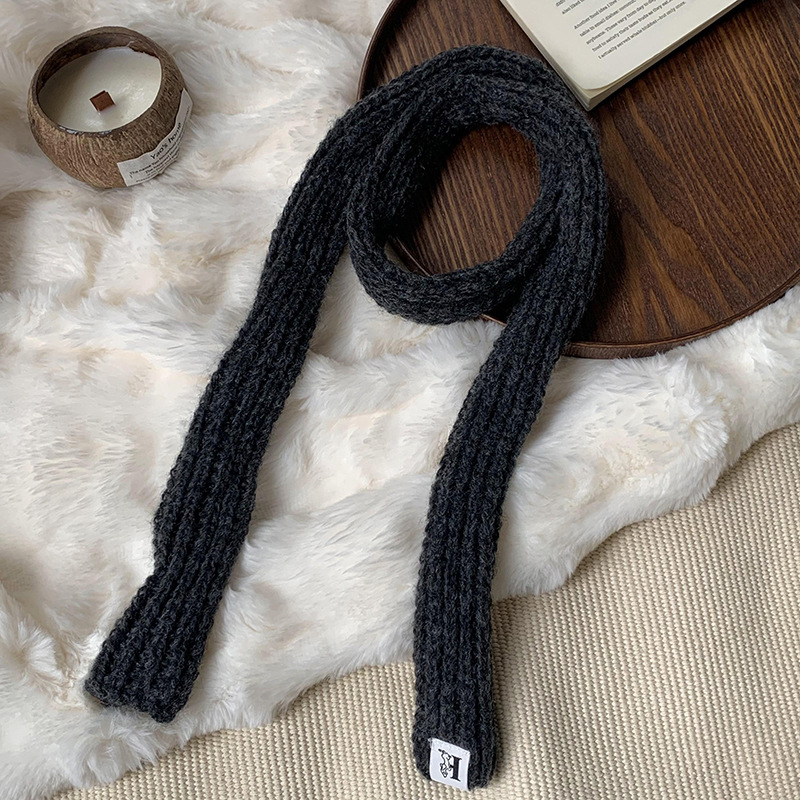 Otoño y invierno bufandas mujeres 2025 nuevo color sólido caliente de protección de cuello de lana de punto largo bufandas al por mayor