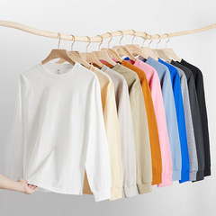 2024秋のカジュアルな純色の丸首の上着の純綿のゆったりした長袖のtシャツの男性は重ねてインナーシャツの男性を着ます。