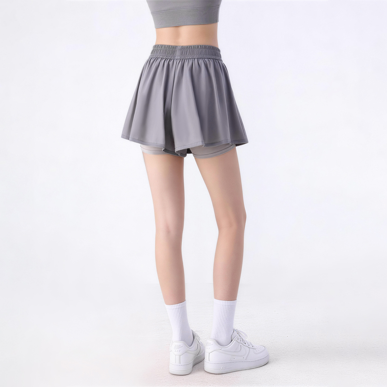 Verano ligero y transpirable falda de yoga falda de tenis anti-luz corredora falda deportiva para adelgazar falda de busto