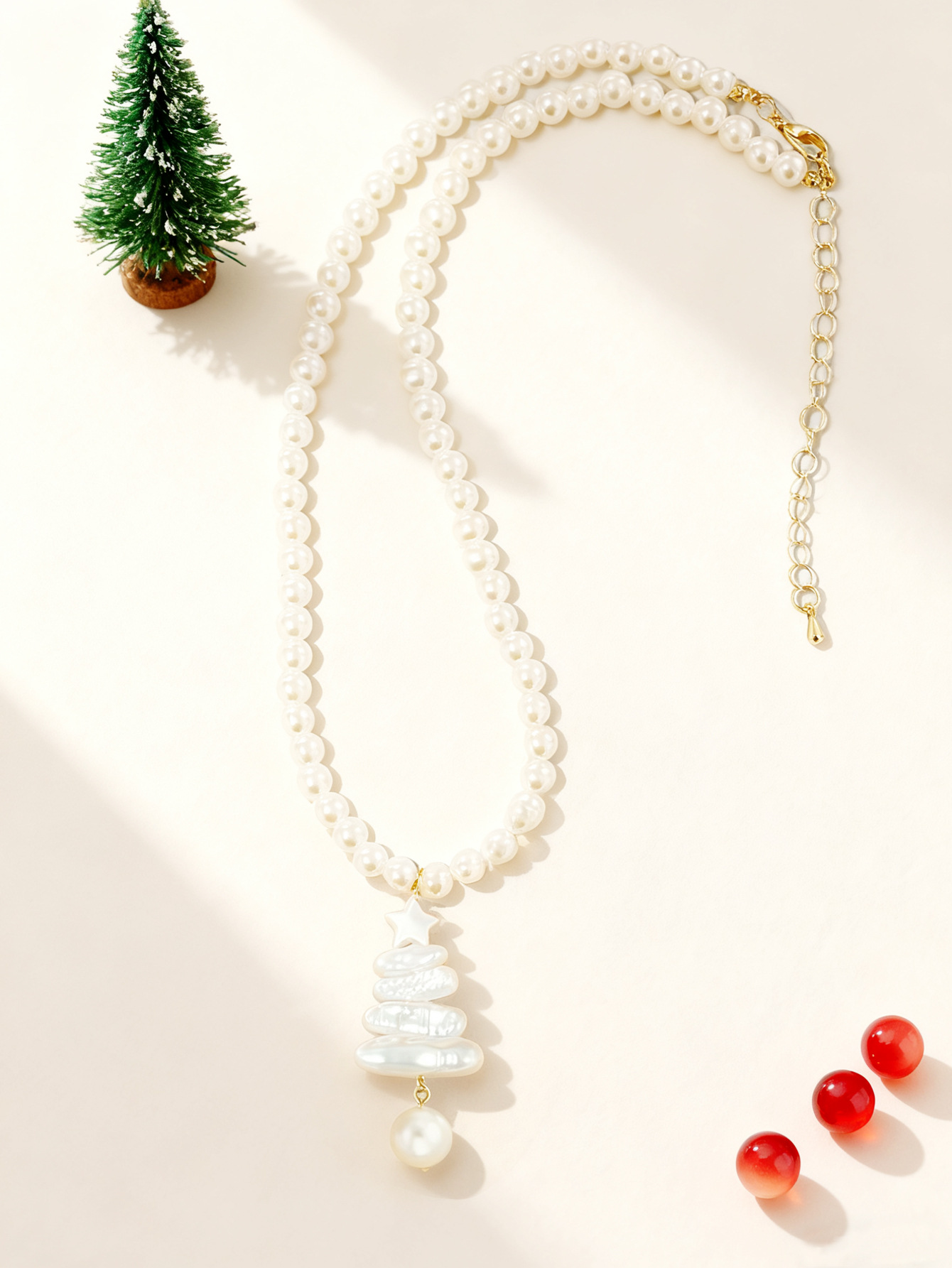 Orecchini pendenti con perle barocche e stelle gioielli donna_voghion.com