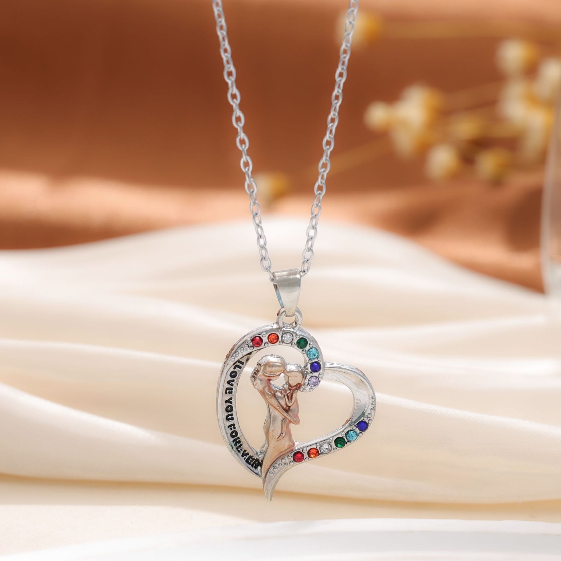 Venta caliente transfronteriza europea y americana colgante de amor de diamantes coloridos en forma de corazón collar de mujer collar de unicornio regalo del día de la madre