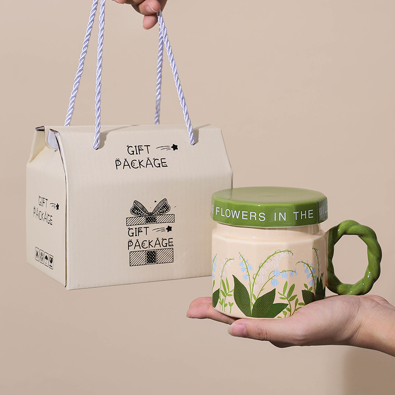 Taza de cerámica con tapa Taza de agua de alto valor Taza de oficina Taza de café con regalo de mano Taza de desayuno femenino Hombre