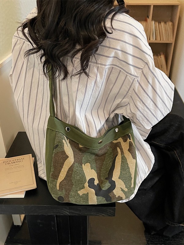 Casual bolso de camuflaje de gran capacidad para mujeres 2026 nuevo lienzo retrógrado simple mochila de hombro para viajar bolsa