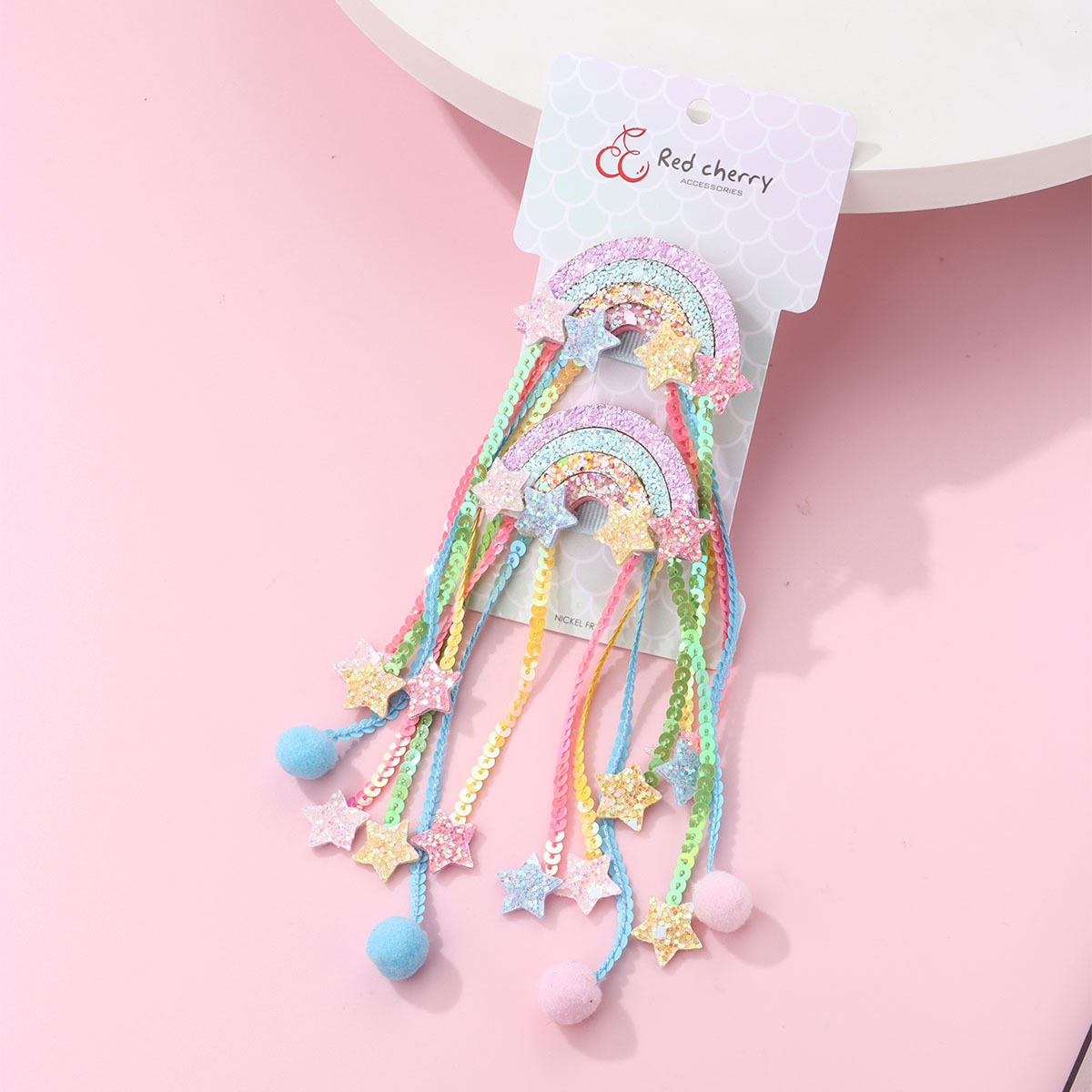 Fermagli per capelli stella arcobaleno con paillettes e nappe_voghion.com