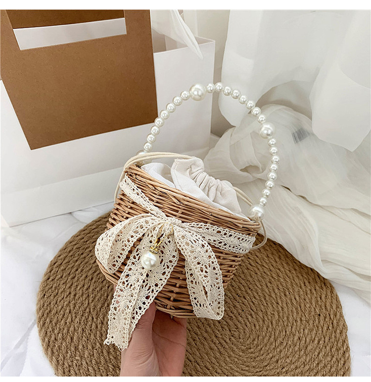 Fashion Round Straw Pearl Portable Bag display picture 22