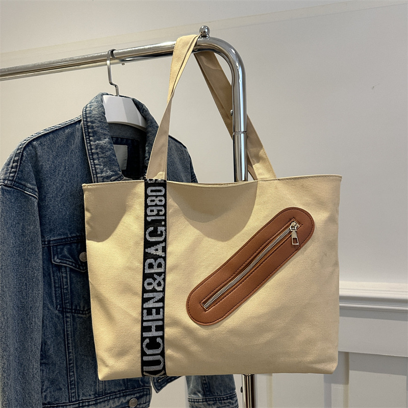 Bolsa de lona para mujeres 2024 invierno nueva moda de gran capacidad de hombro brazo bolso de mano de viaje ocio bolso de mano