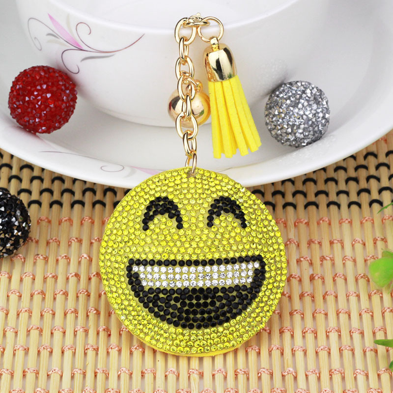 Nuevo creativo cara sonriente coreana llavero de diamante de moda borda de dama bolsos colgantes joyerías de comercio exterior al por mayor