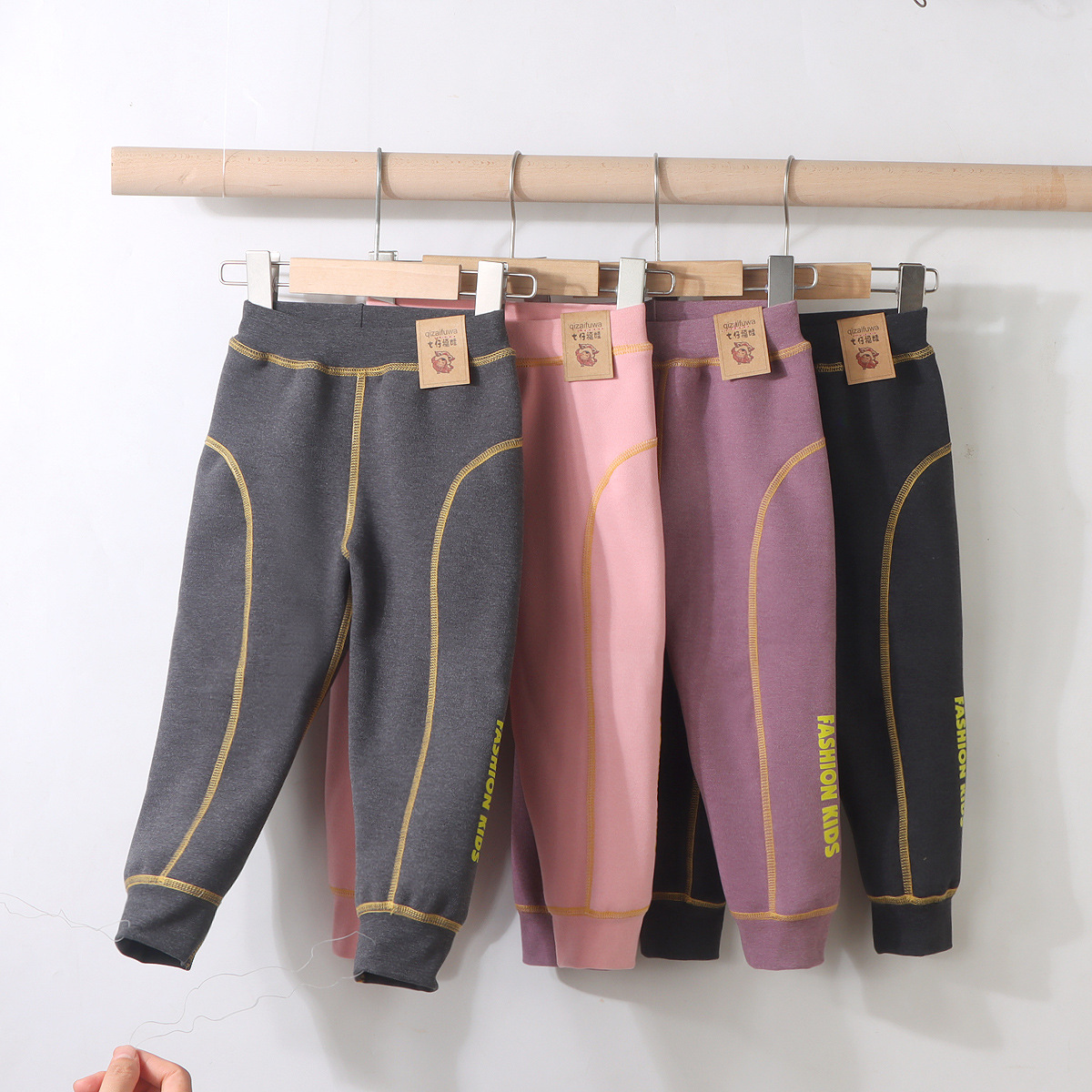 Pantalones de otoño para niños pantalones de calentamiento gruesos para niñas niños pantalones de algodón para estudiantes sin hueso de terciopelo leggings al por mayor