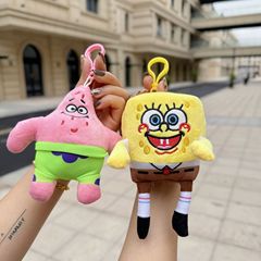 かわいいアニメのスポンジの赤ちゃんの派の大星のぬいぐるみのぬいぐるみのリュックサックはキーホルダーを飾ります。