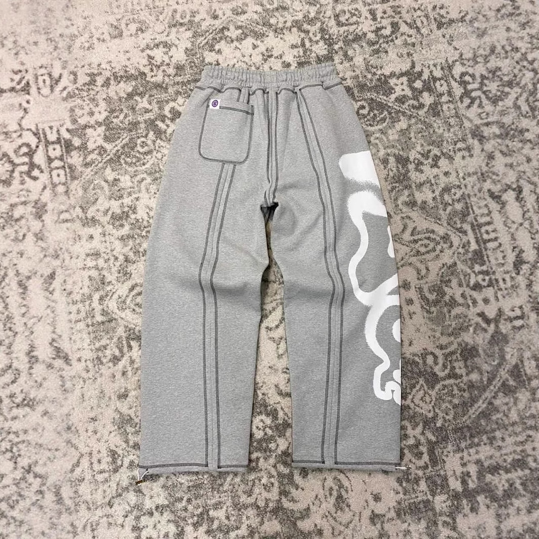 Pantalones de hombre de tendencia transfronteriza europea y americana nueva moda hip-hop street retro holgado casual estampado recto pantalones casuales