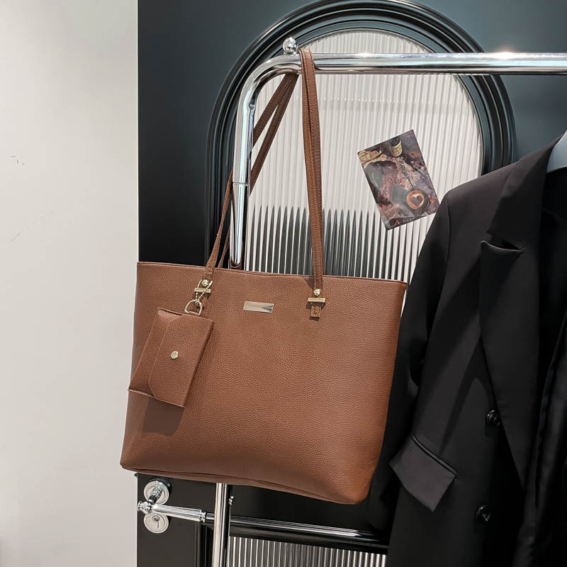 Simple paquete coreano de gran capacidad para niños y madres 2025 nuevo tipo de bolso para mujeres relajado sensación suave hombro bolso axilar