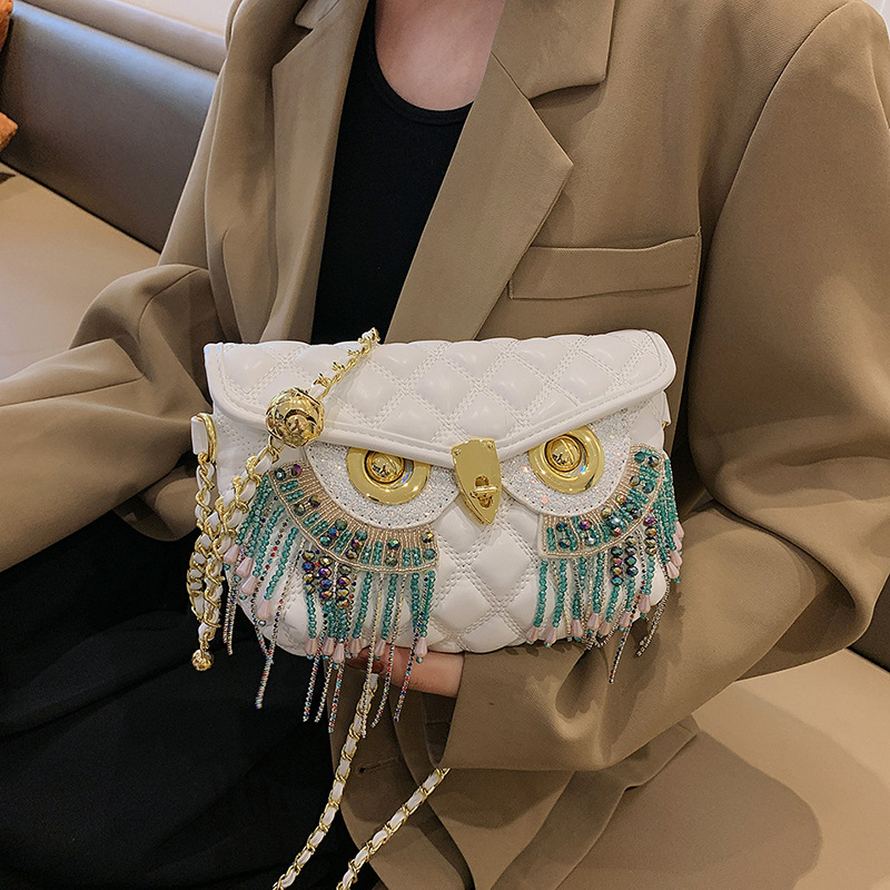 Syksyn ja talven uusi tekstuuri, raskaan teollisuuden muotoilu, trendikäs monikäyttöinen ketjulla varustettu tupsupöllö, naisten yksiolkainen olkalaukku_voghion.com