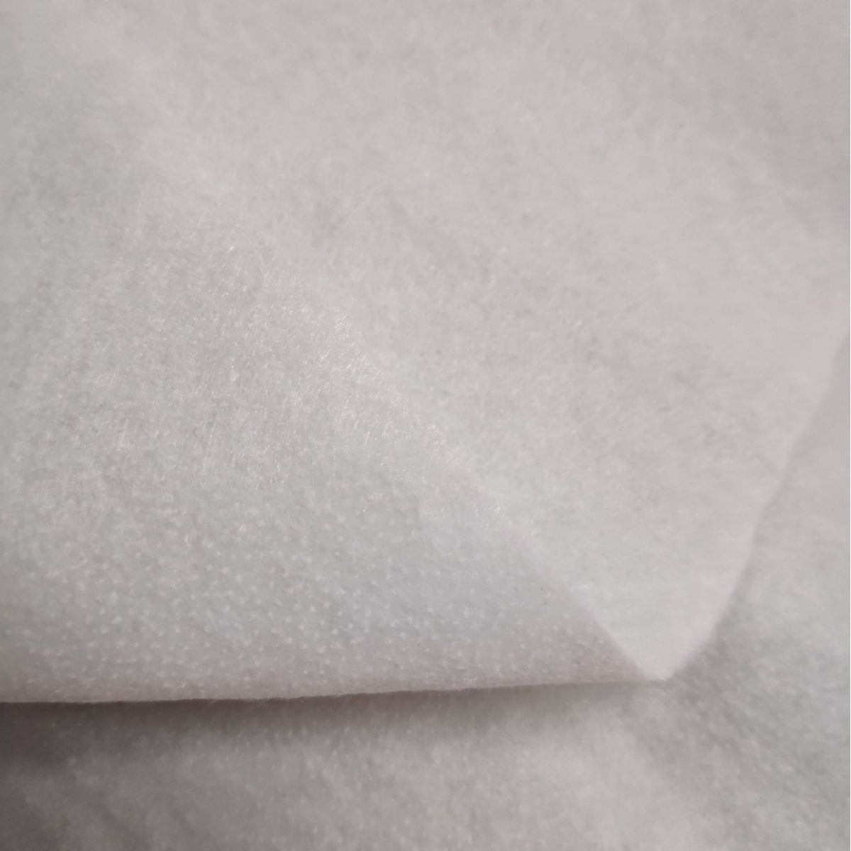 120克单面带胶铺棉柔软型细胶辅棉针刺棉有胶棉服装带胶棉需加热