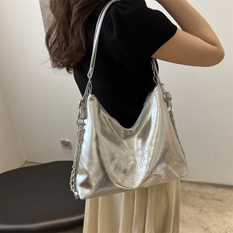 Casual bolsa de plata de gran capacidad para mujeres 2024 nuevo paquete de hombro universal mochila de hombro bolsas de cubo de viaje