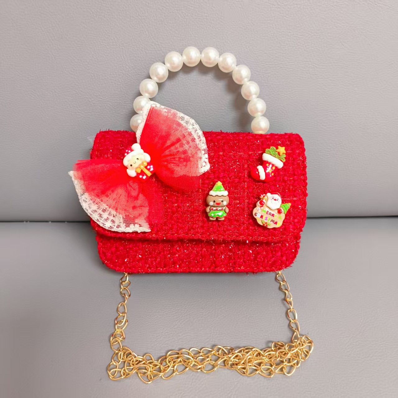 Cartera de Año Nuevo rojo arco de papá Noel bolso de perla pequeña cadena de viento fragante bolso de hombro