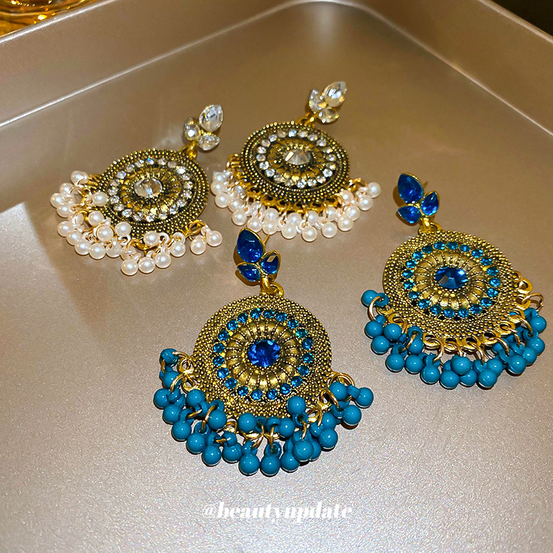 Pendientes de borla de gota de agua de diamantes de estilo étnico Pendientes de diseño de viajes de nicho retro femenino Pendientes de lujo ligero de alta gama