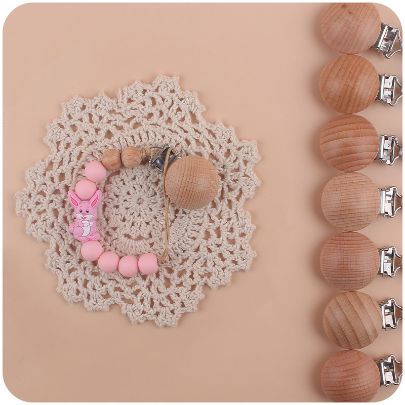 Nuevo bebé suministros dibujos animados conejo mordedor creativo lindo DIY mordedura molar pezón cadena anti-gota cuerda de la cadena