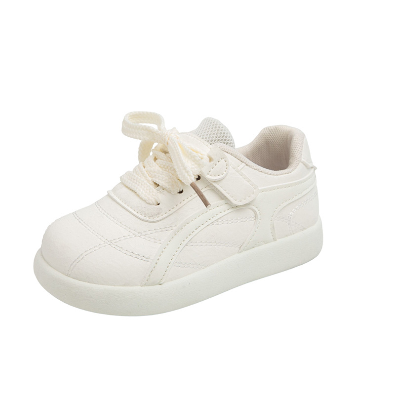 Zapatos deportivos de niñas estudiantes pequeños zapatos blancos versátiles primavera y otoño 2026 nuevos zapatos de skate para niños con suela suave zapatos casuales para niños