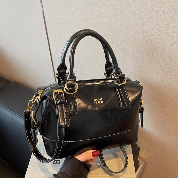 Nicho Zhong bolso de mano de tendencia retro mujer 2025 nuevo paquete de hombro casual universal viaje de alta calidad sensación de mochila