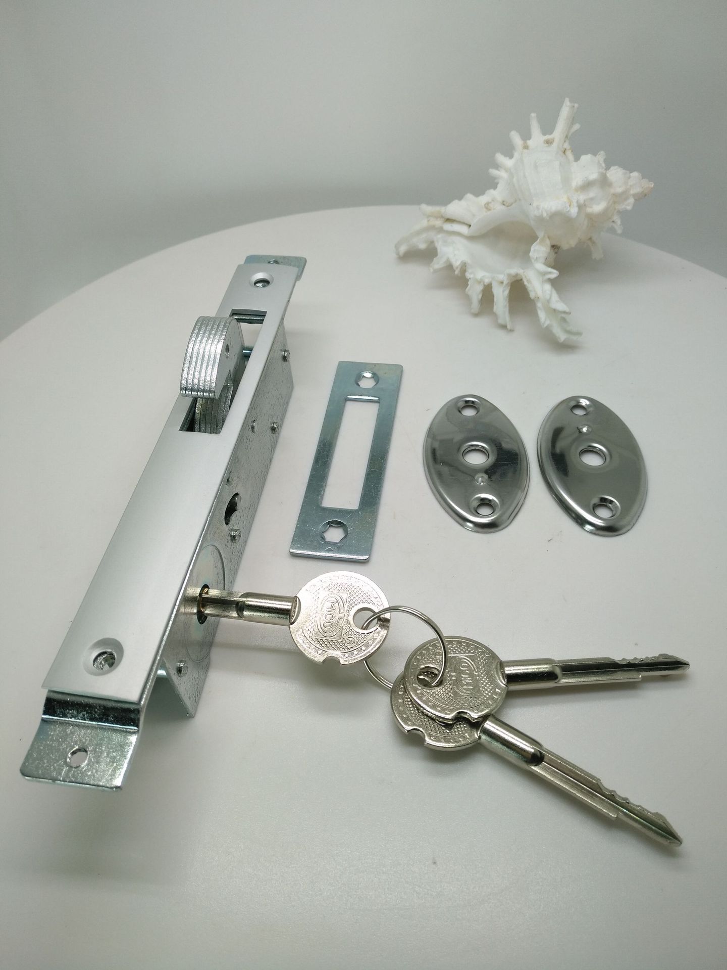 Puerta de aleación de aluminio del sur de China y cerradura de ventana puerta de vidrio cerradura de piso empuje cerradura de la puerta ventilador alto 41055 tipo cerradura de la puerta cerradura antirrobo