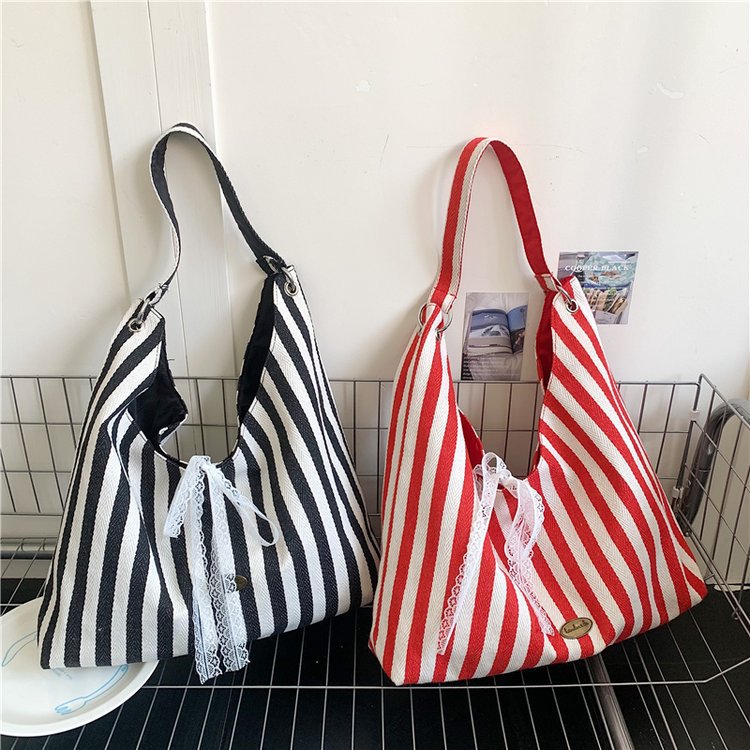 여성을위한 여름 대용량 수 놓은 캔버스 가방 2025 줄무늬 편지 통근 숄더 백 양면 휴대용 토트 백