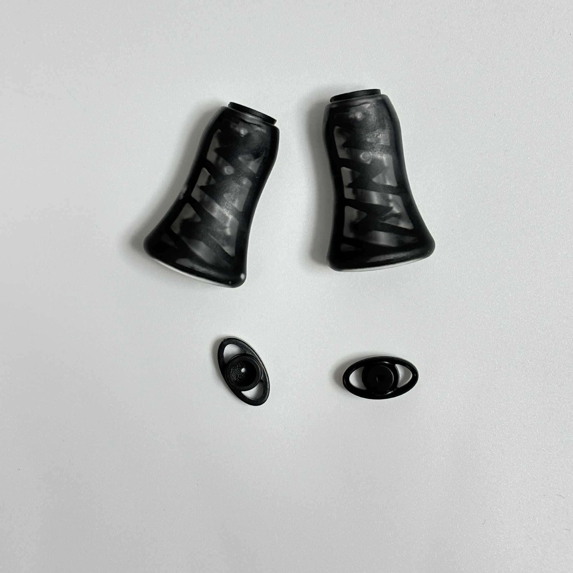 A pair of black silicone grip balls