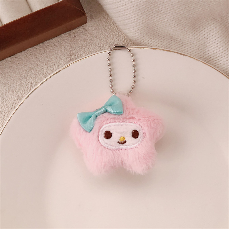 Nuevo estilo de felpa linda de dibujos animados arco estrella muñeca colgante monedero felpa auricular estuche llavero colgante