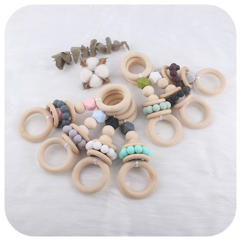 Mordedor creativo de juguete para niños nuevos Anillo Hemu bebé sonajero de mano ejercicio interactivo juguete de fortalecimiento dental palo de molienda