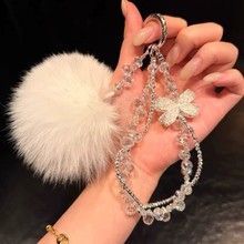 【冬日恋语】精致蝴蝶结爆闪水晶串珠手机链可爱毛绒球包包挂链女