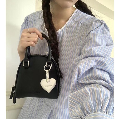 Rourou Chen Whiterm Korean version niche design women's bag new cute portable shell bag single shoulder crossbody bag