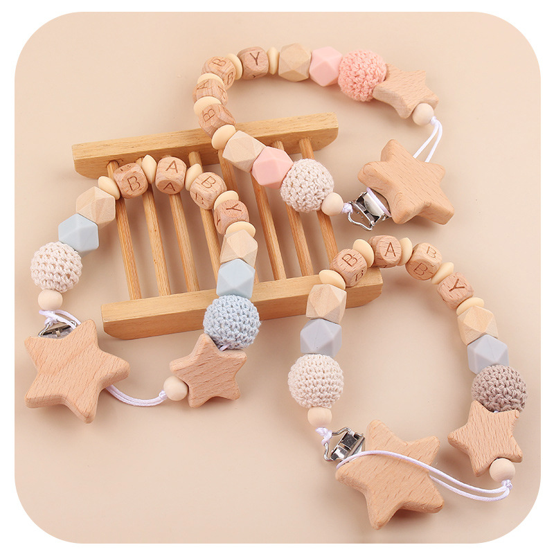 Nuevos productos para bebés abrazaderas de abrazaderas de haz de dibujos animados DIY pulsera de dientes molares decoración colgante de campana cuatro piezas