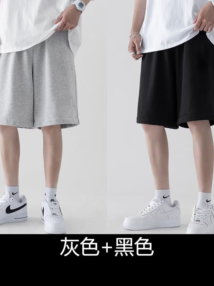 Pantalones de moda para hombres, pantalones casuales coreanos sueltos, versátiles, cinco puntos, pantalones de playa de nuevo tamaño grande de verano