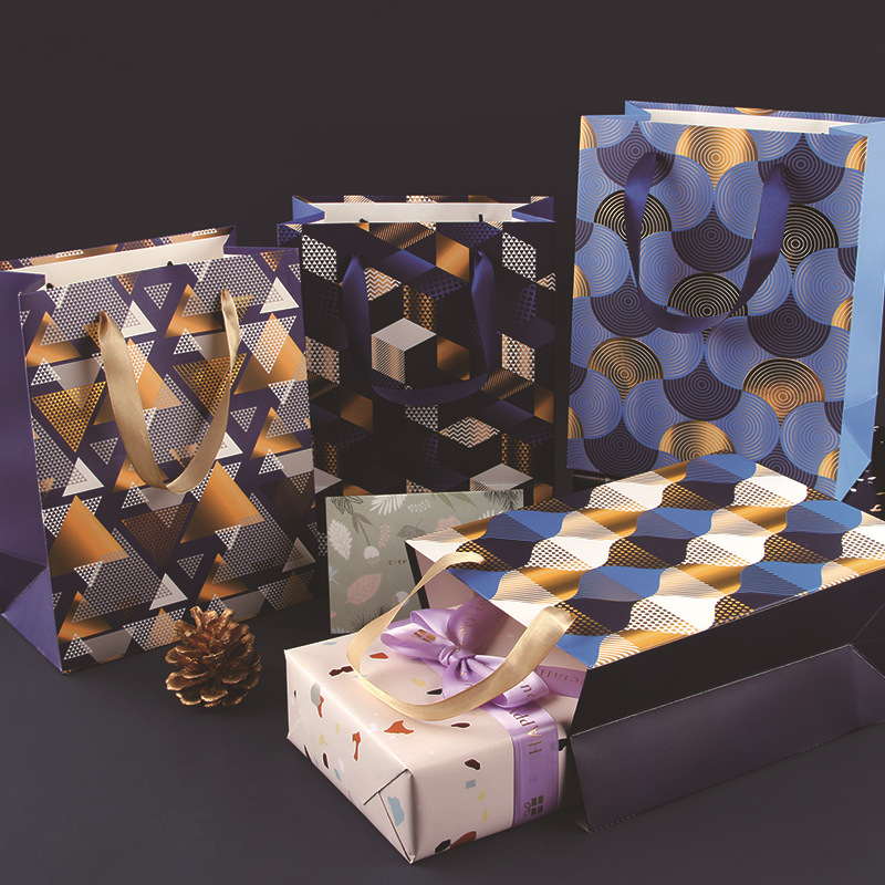 新款烫金撒粉手提袋加厚纸袋白卡服装袋子牛皮礼品袋环保跨境热销