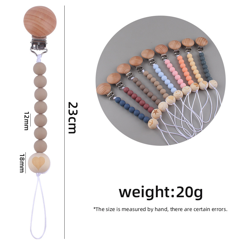 Nuevos suministros para bebés clip de chupete de haya creativo bebé DIY patrón de dibujos animados cuentas de madera Cadena de chupete cadena anti-caída